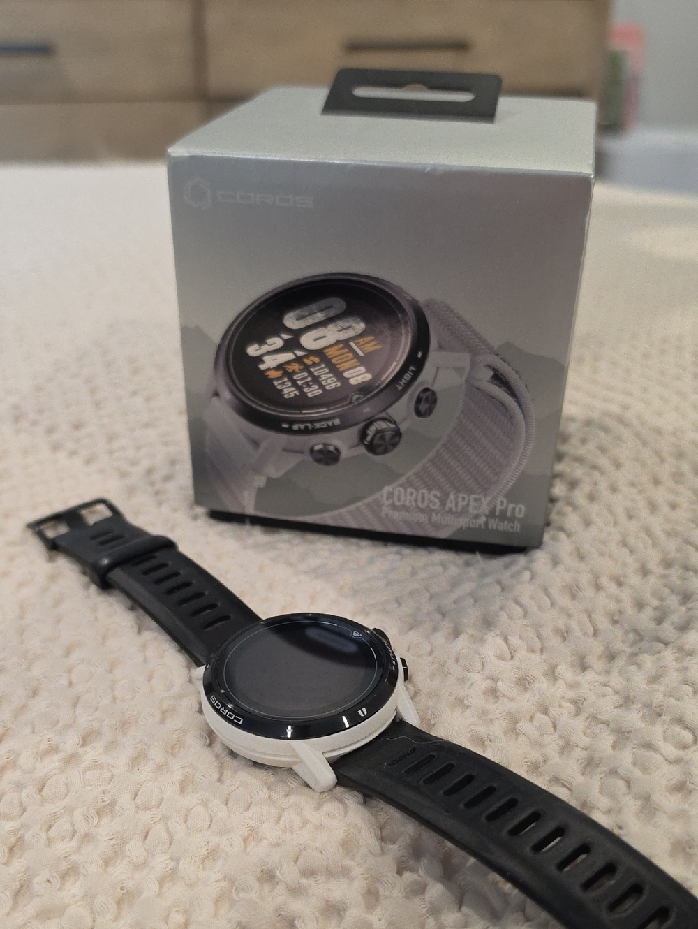 Coro APEX Pro Smartwatch in White with Black Band